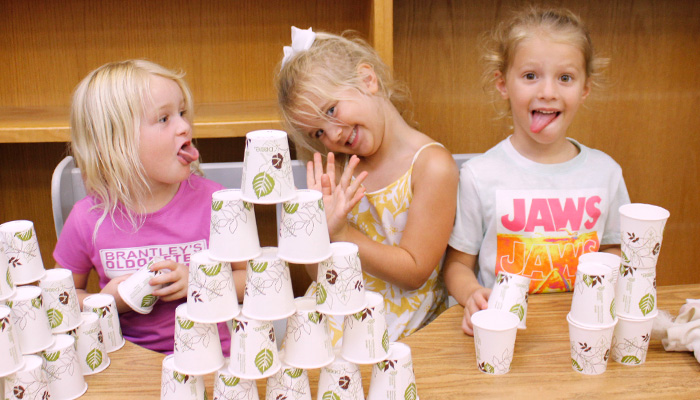 3 girls with paper cups