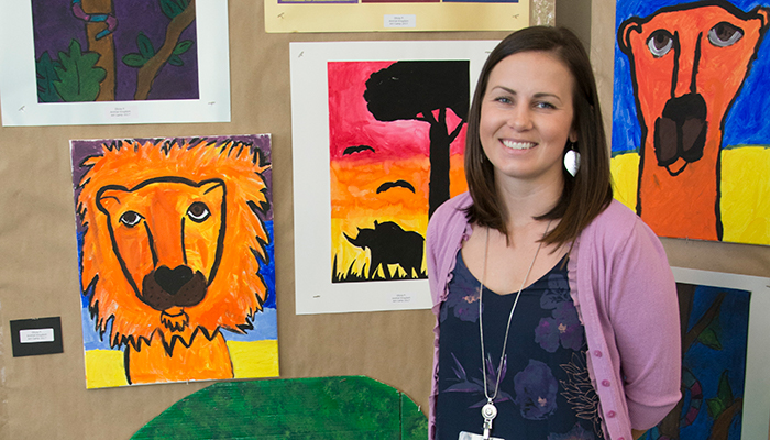 Alli Flores with animal art