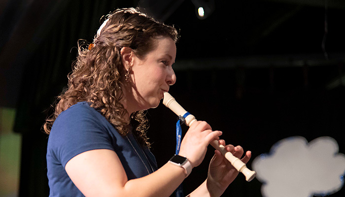 Ms. Barker playing recorder