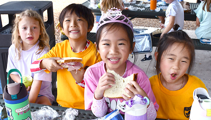 girl wearing tiara with her friends