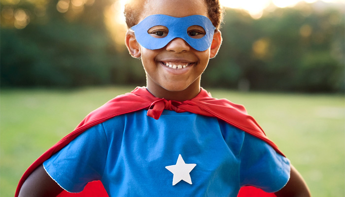 boy dressed as superhero