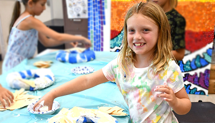 girl working on art project