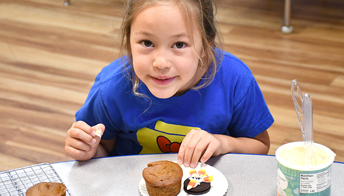 girl with fancy muffin