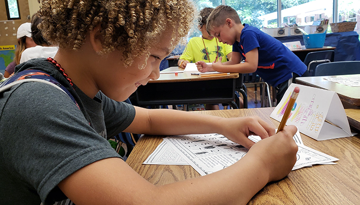 boy working on worksheet