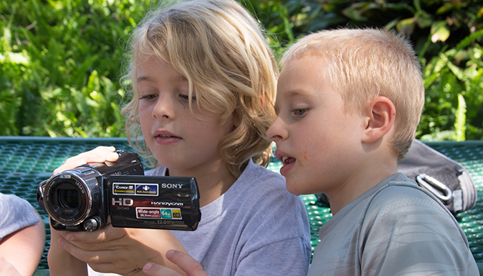 boys using video camera